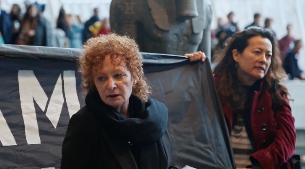 Nan Goldin proclaiming about the atrocity committed by the Sackler family